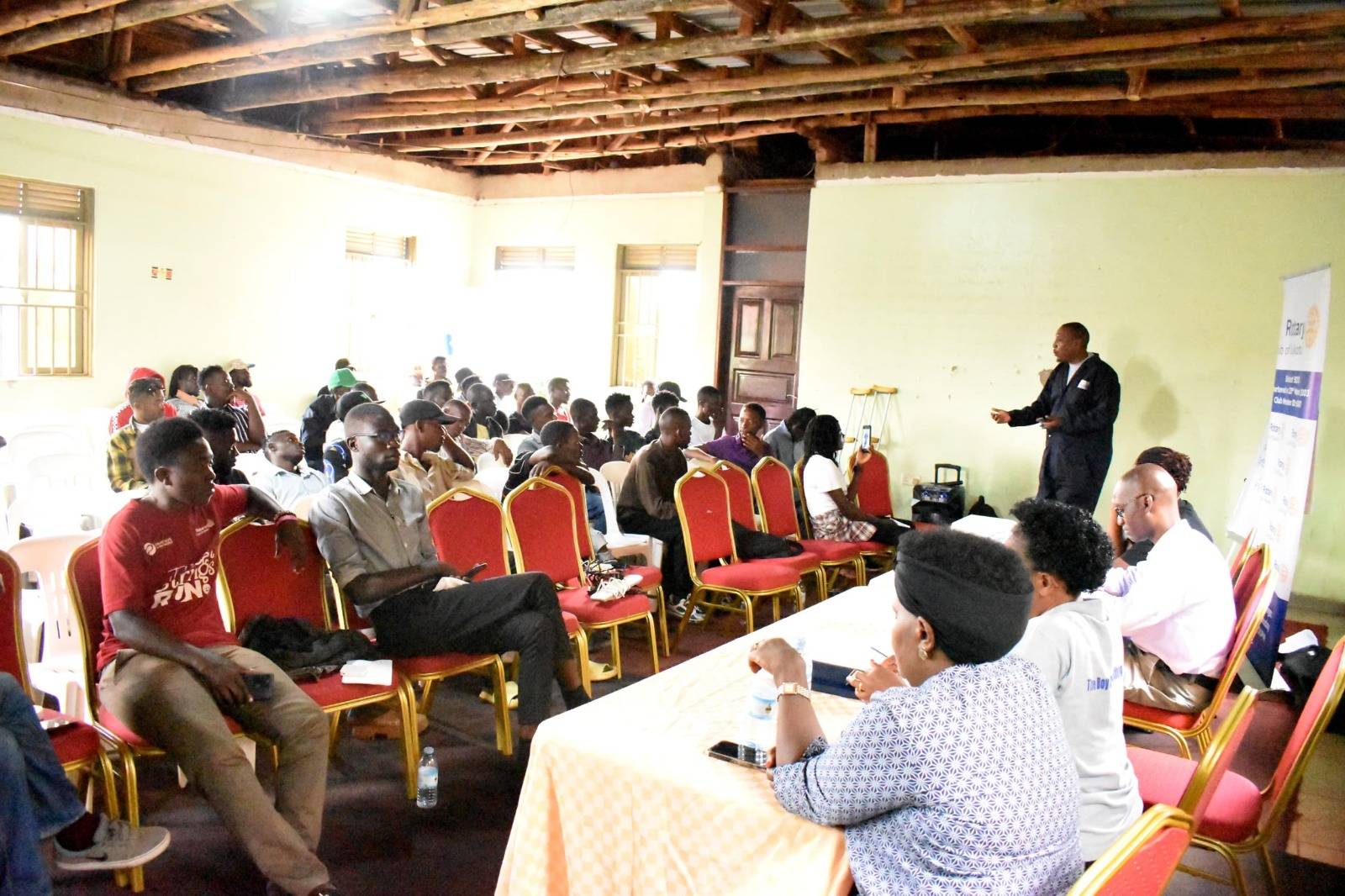 A full community hall during an ADAAM engagement