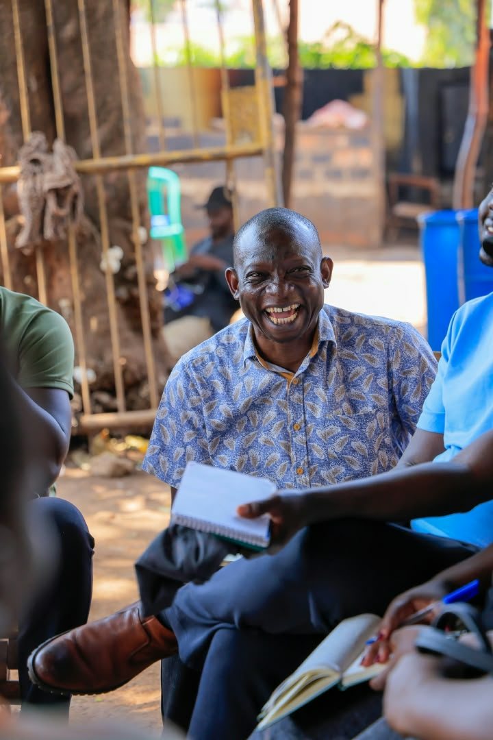 ADAAM team in a seated community discussion — the work is personal